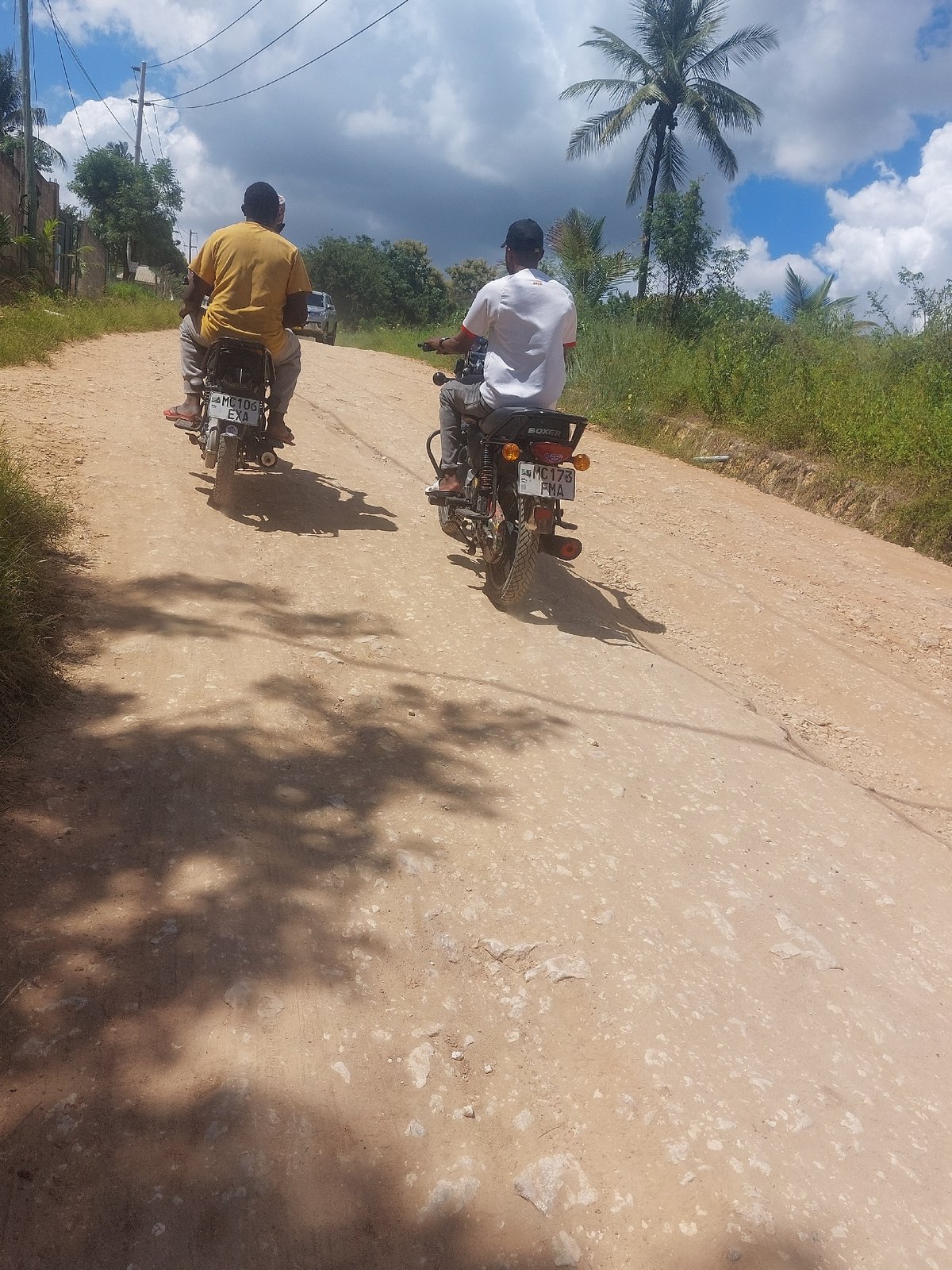 Daily street life documented across Dar es Salaam neighborhoods