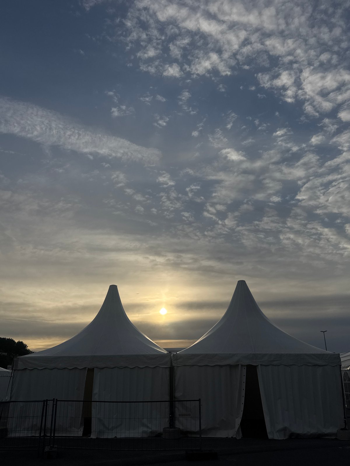 White tent event setup observed in Tallinn marina area
