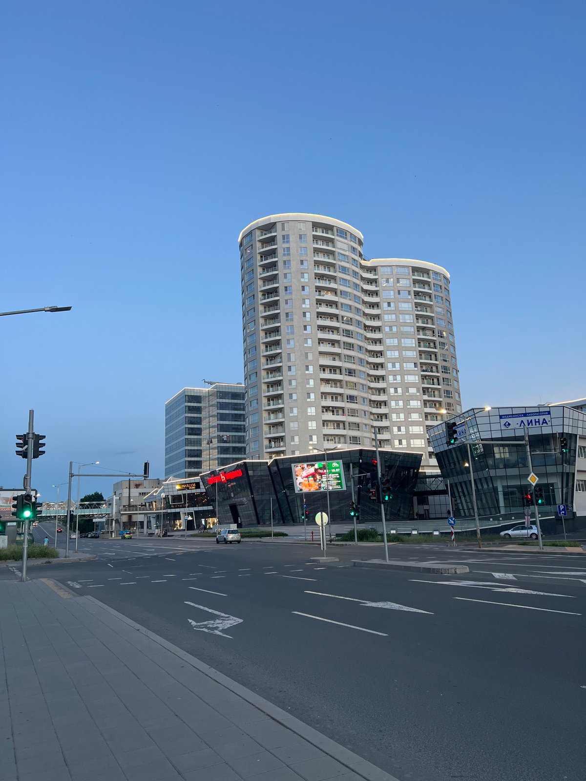 Twilight traffic intersection in downtown Burgas, Bulgaria