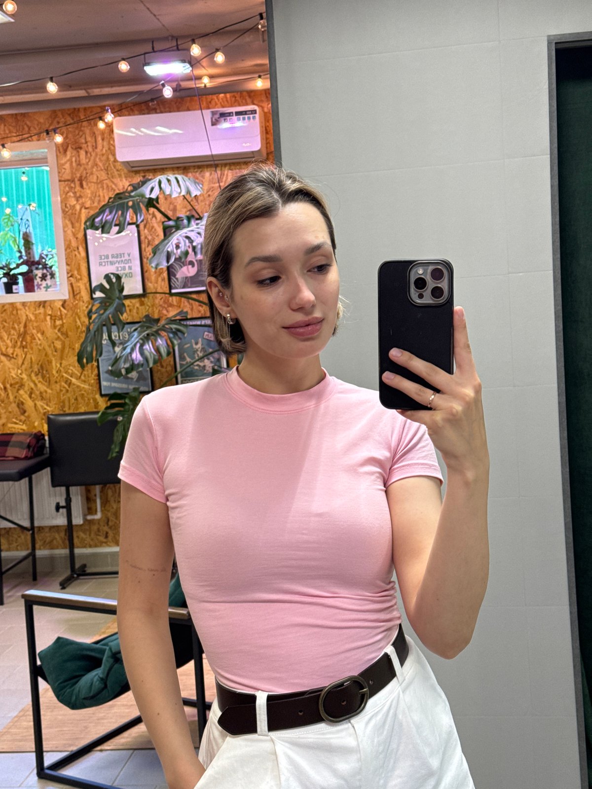 Woman documents Hello Kitty guitar session in multiple selfies