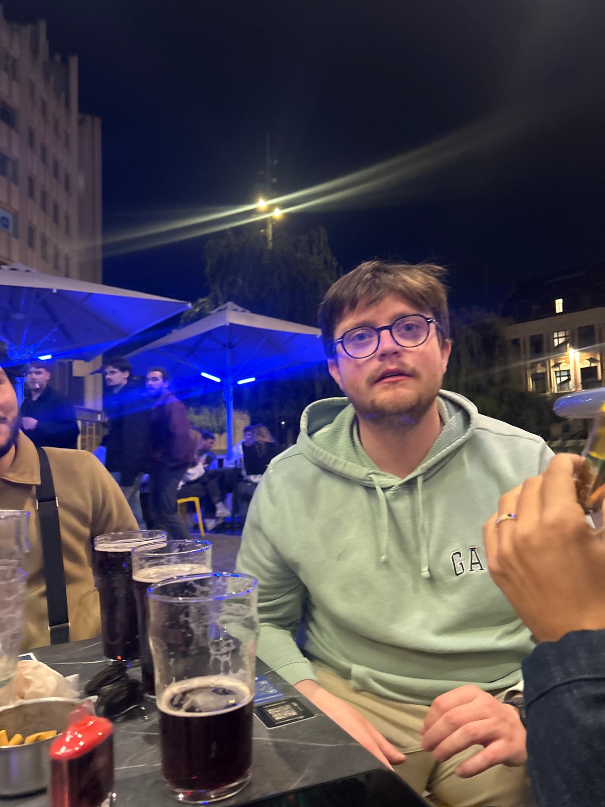 Evening social scenes captured at Lille cafes and bars