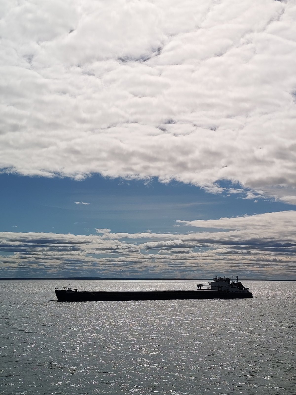 Cargo barge crosses Lake Beloye near Belozersk, Russia