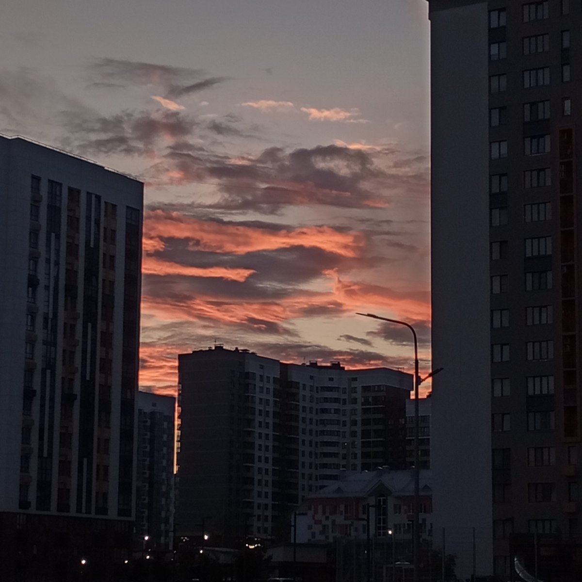 Dramatic sunset sky captured over residential Izhevsk, Russia