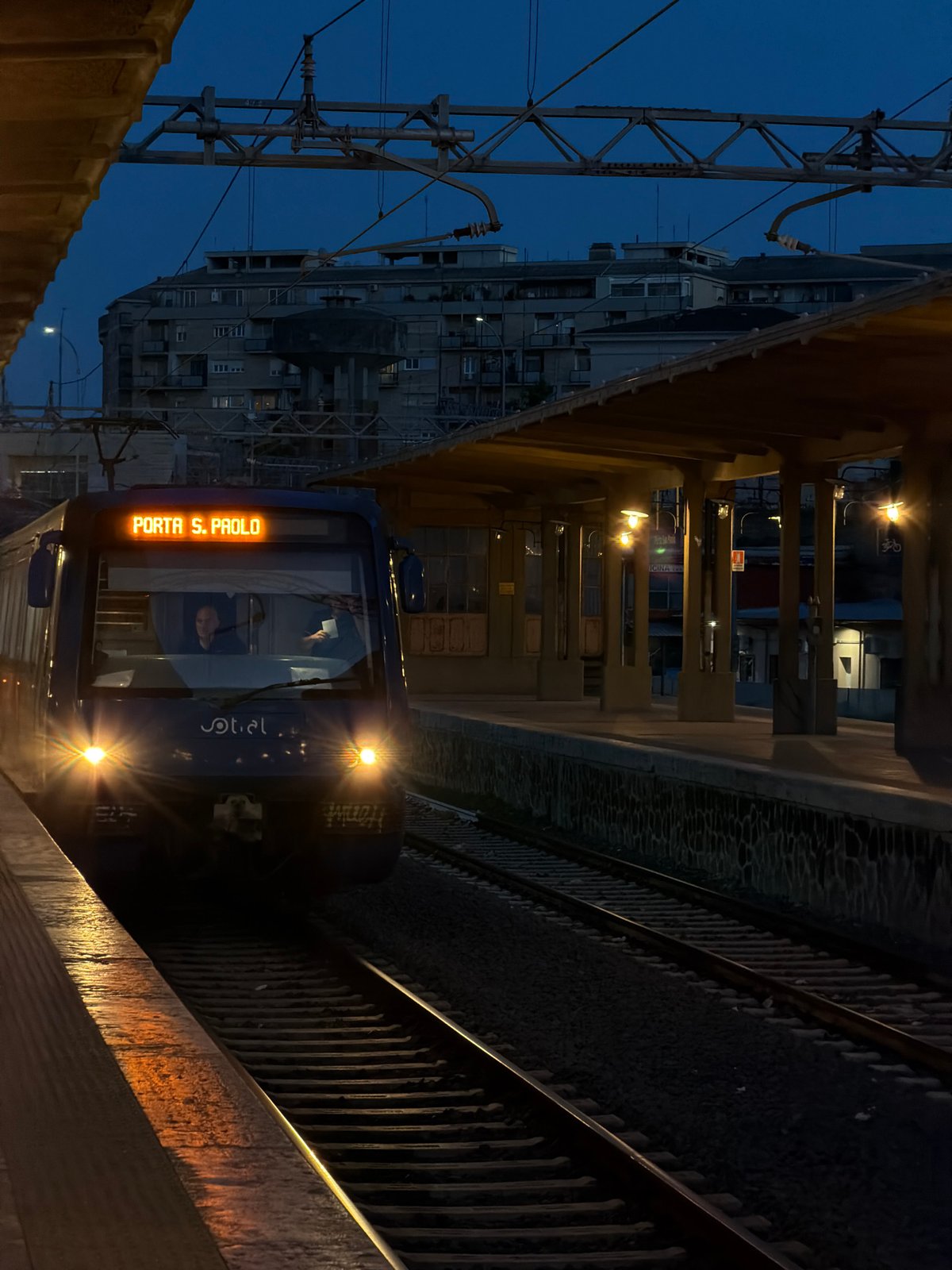 Evening commute documented through Rome's transit system at Porta San Paolo
