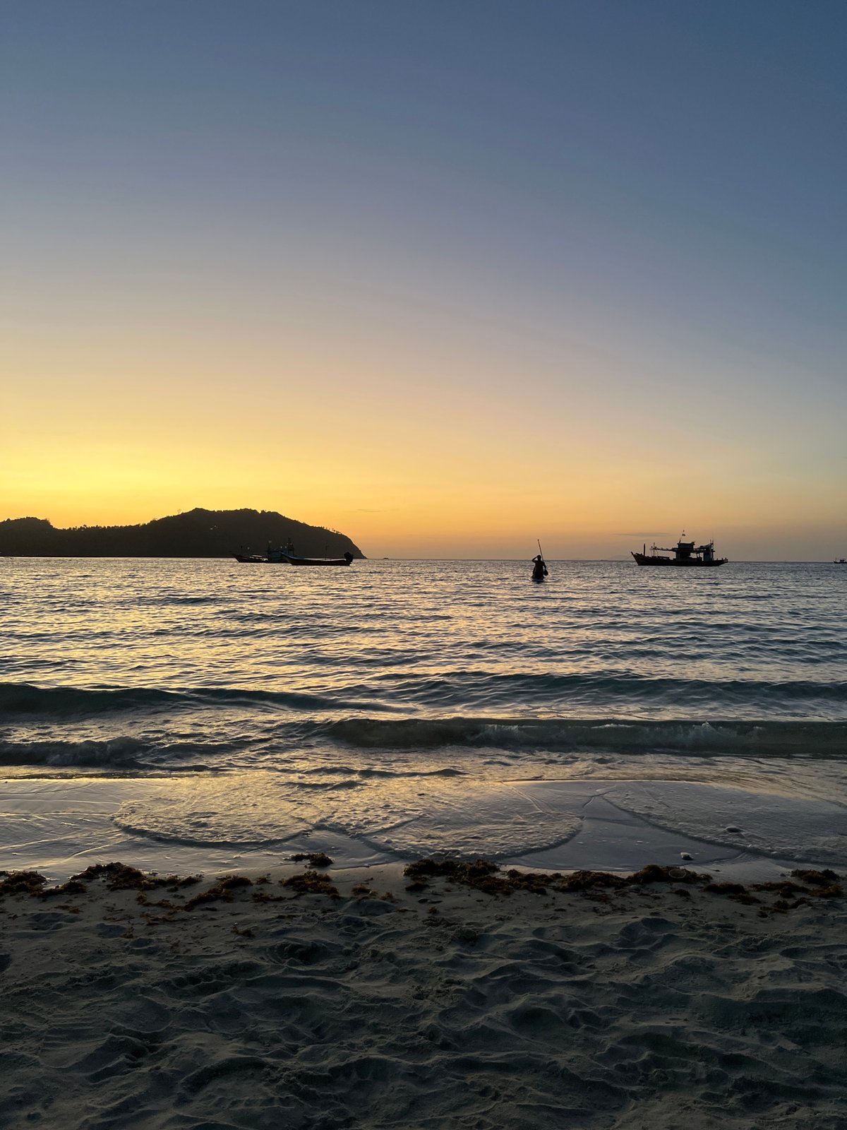 Dusk settles over a Ko Pha-ngan beach, water and all