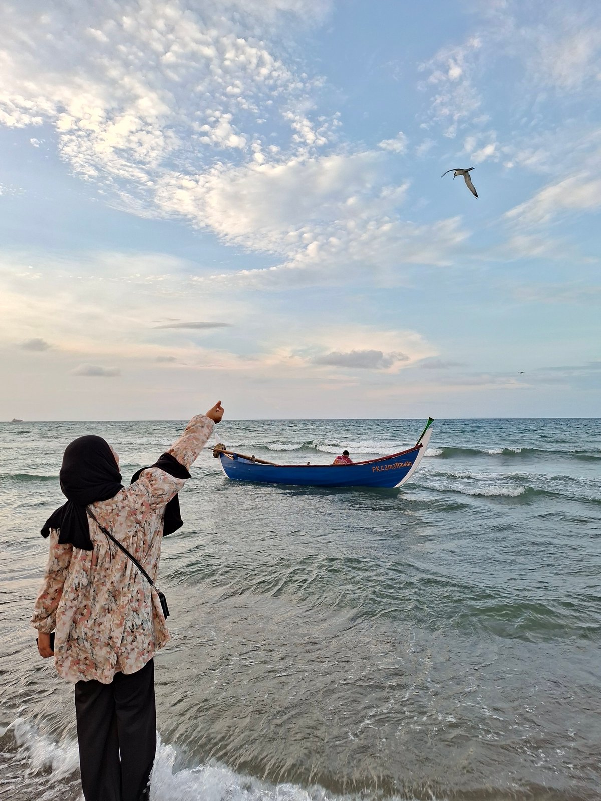 Morning fishing and beach activities documented in Lhokseumawe, Indonesia