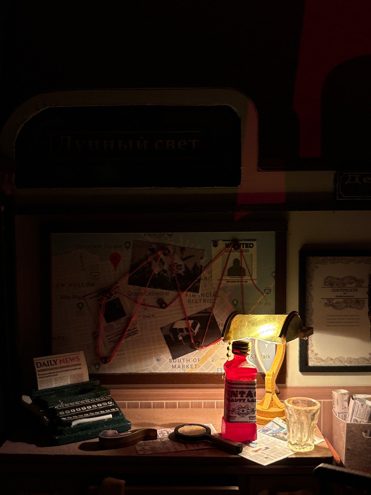 Cozy desk setup and detailed detective dioramas, Radkevshchina evening