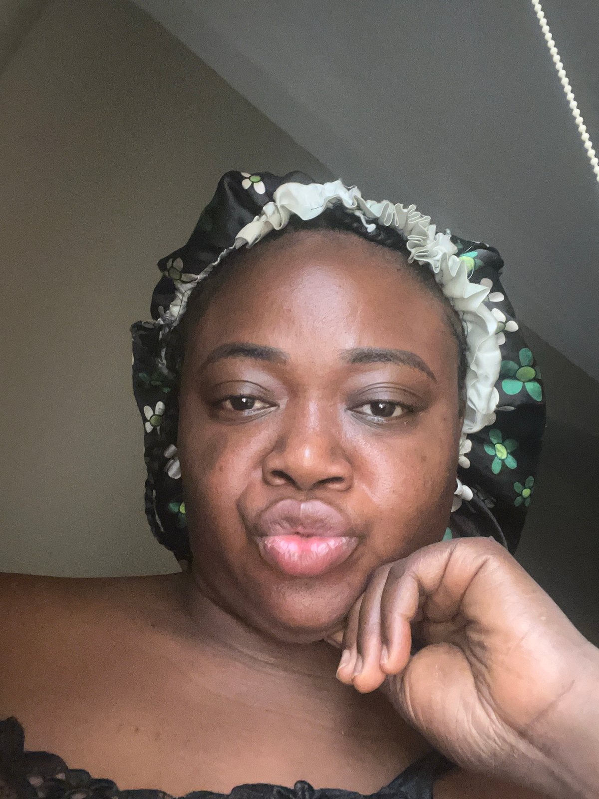 Morning portrait session captured in Abuja bedroom