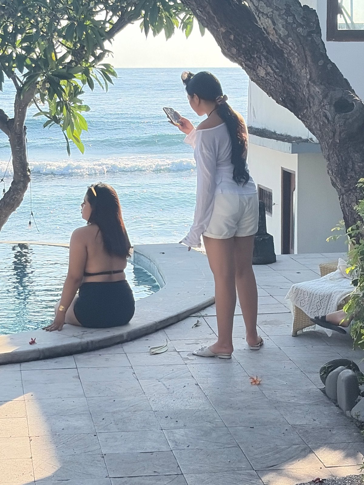 Lazy beach day at a coastal resort in Abang, Bali