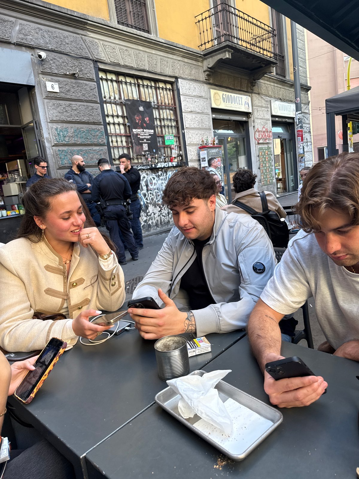 Cafe gathering with smartphones observed in Milan