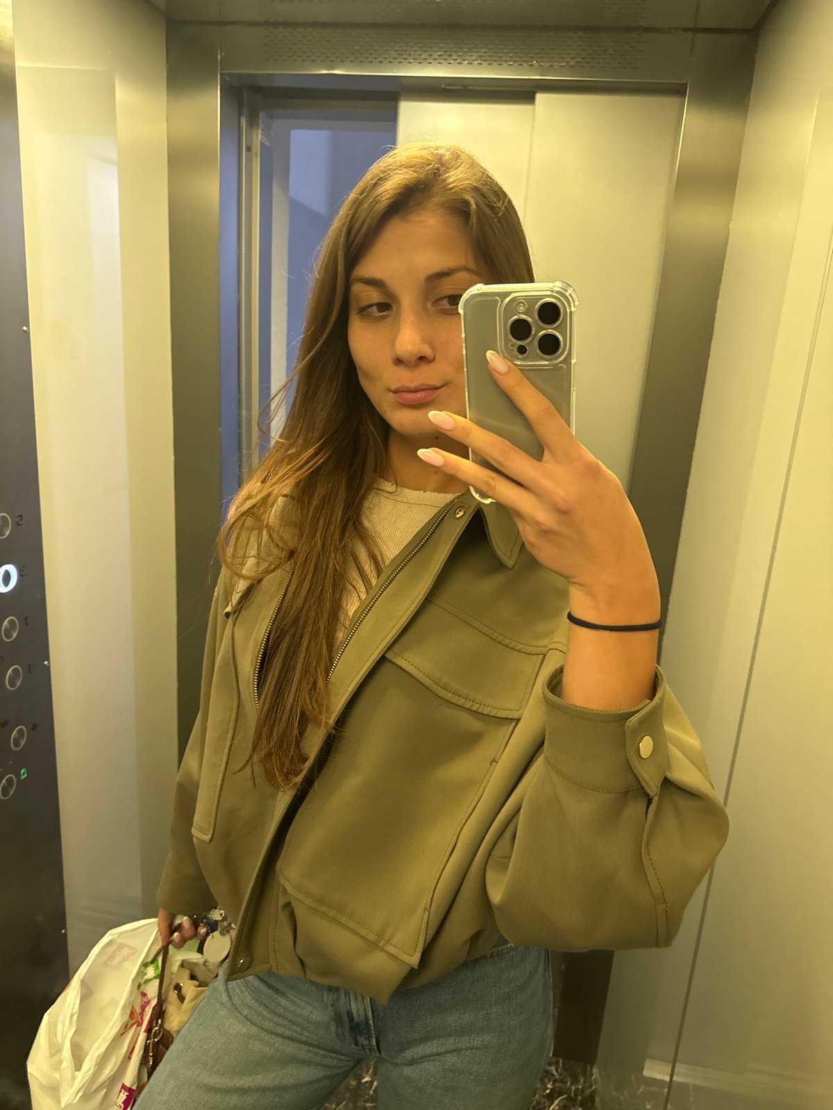 Woman takes elevator selfies in Burgas, Bulgaria
