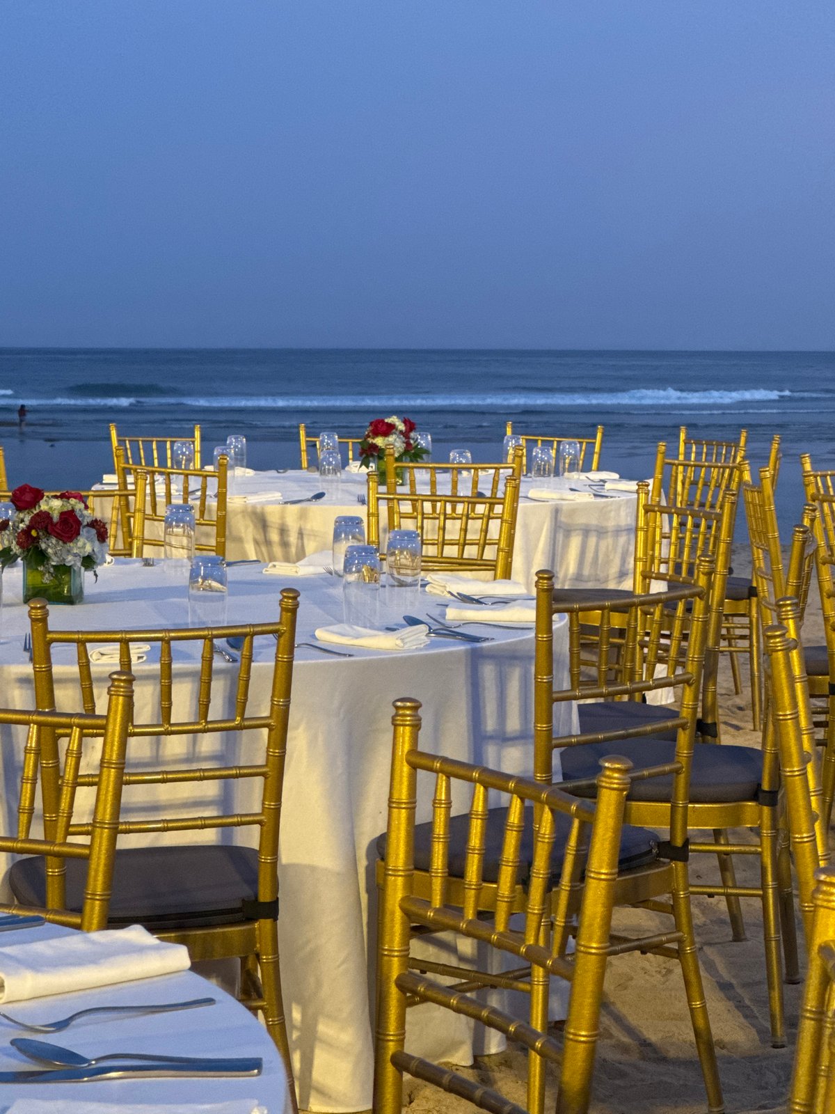 Beach wedding reception setup captured in Kuta Selatan, Indonesia
