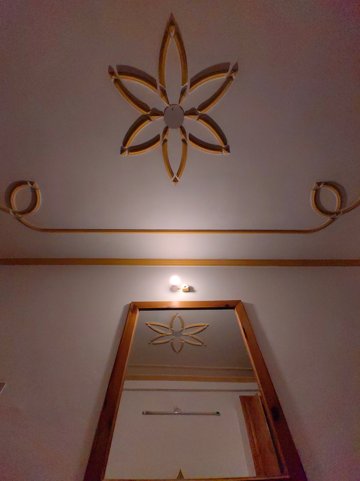 Ornate gold ceiling details inside a Vashisht interior