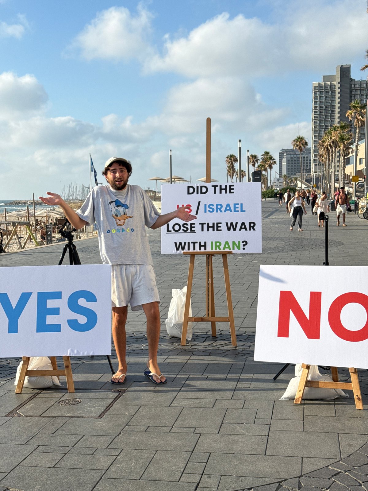 A busy Tel Aviv afternoon — protests, cafés, and construction
