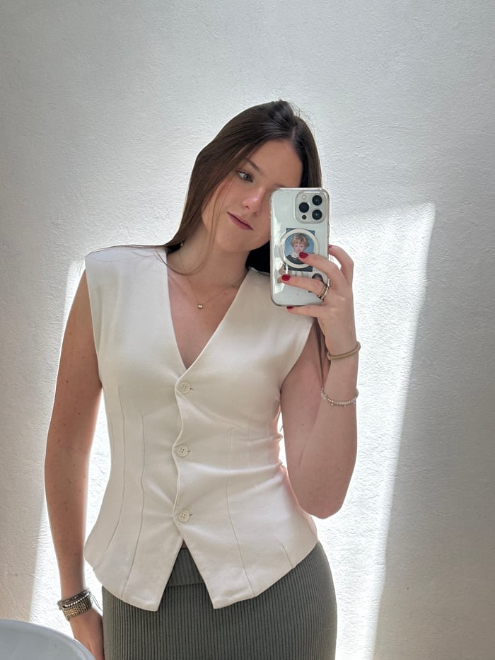 Young woman photographed in various indoor, outdoor settings