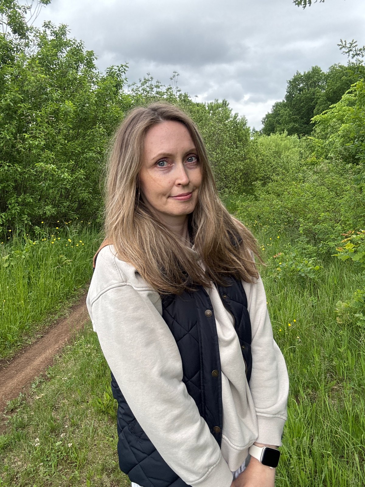 Woman photographed on nature path in Noviy, Russia