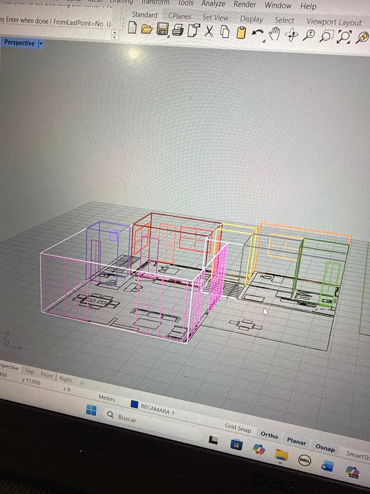 Late-night CAD work on building design in Puebla