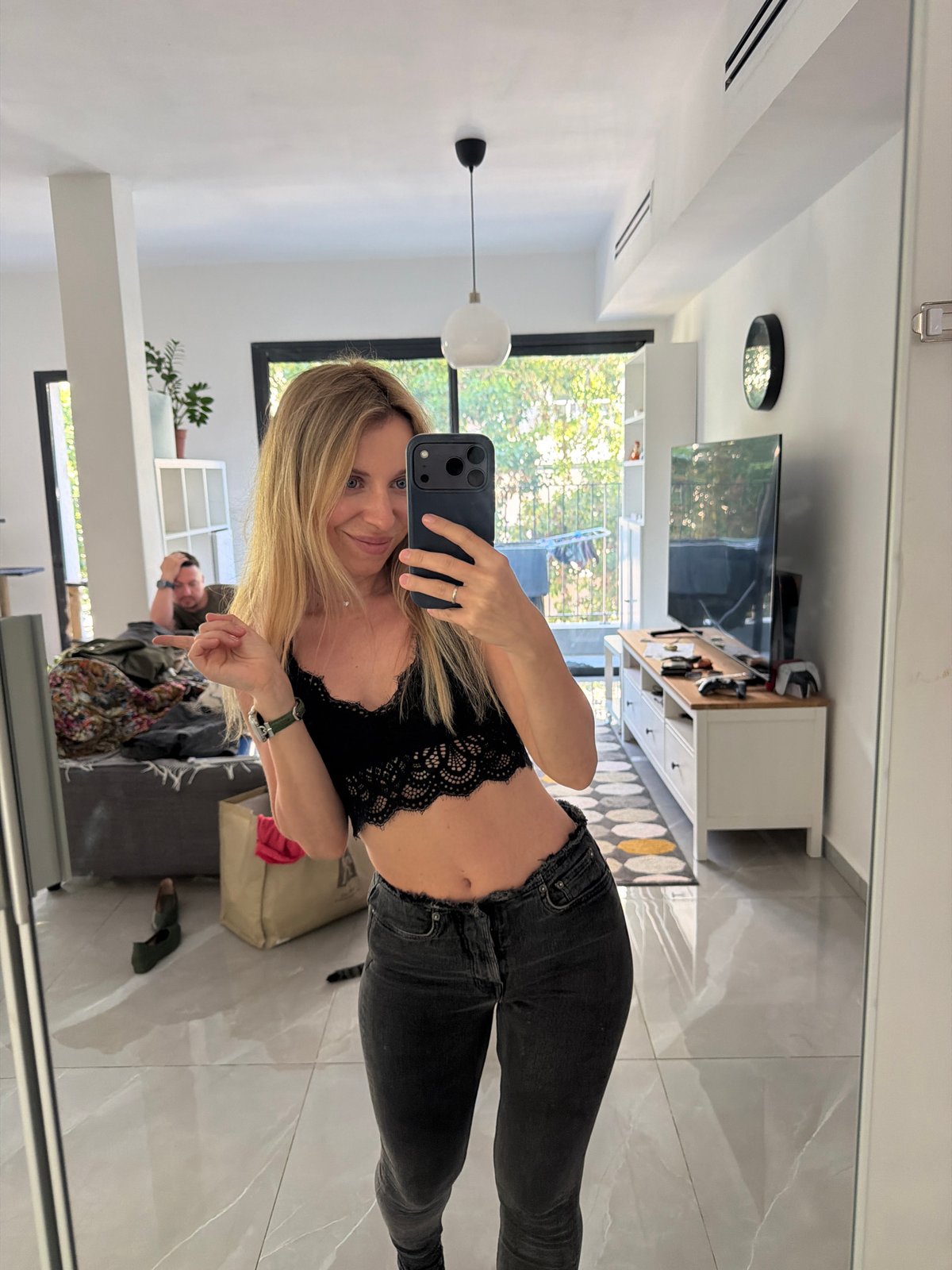 Apartment selfie and a plumeria moment in Bat Yam