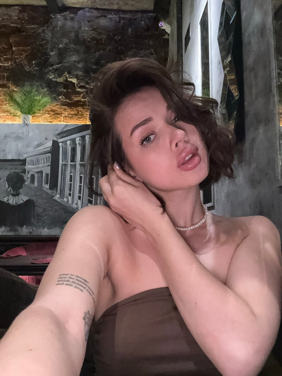 Woman documents evening out at Sarapul restaurant with selfies