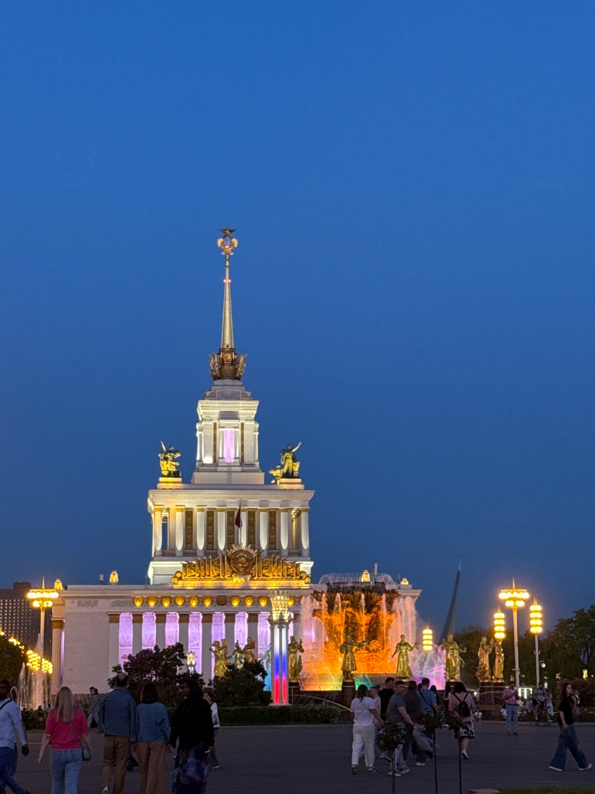 Evening scenes captured at illuminated Moscow government building and park