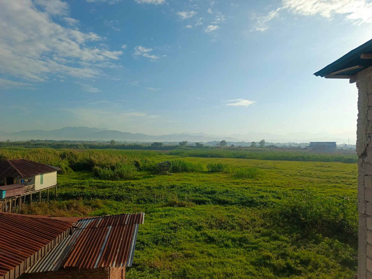 Rural hillside housing and landscape in Gorontalo, Indonesia