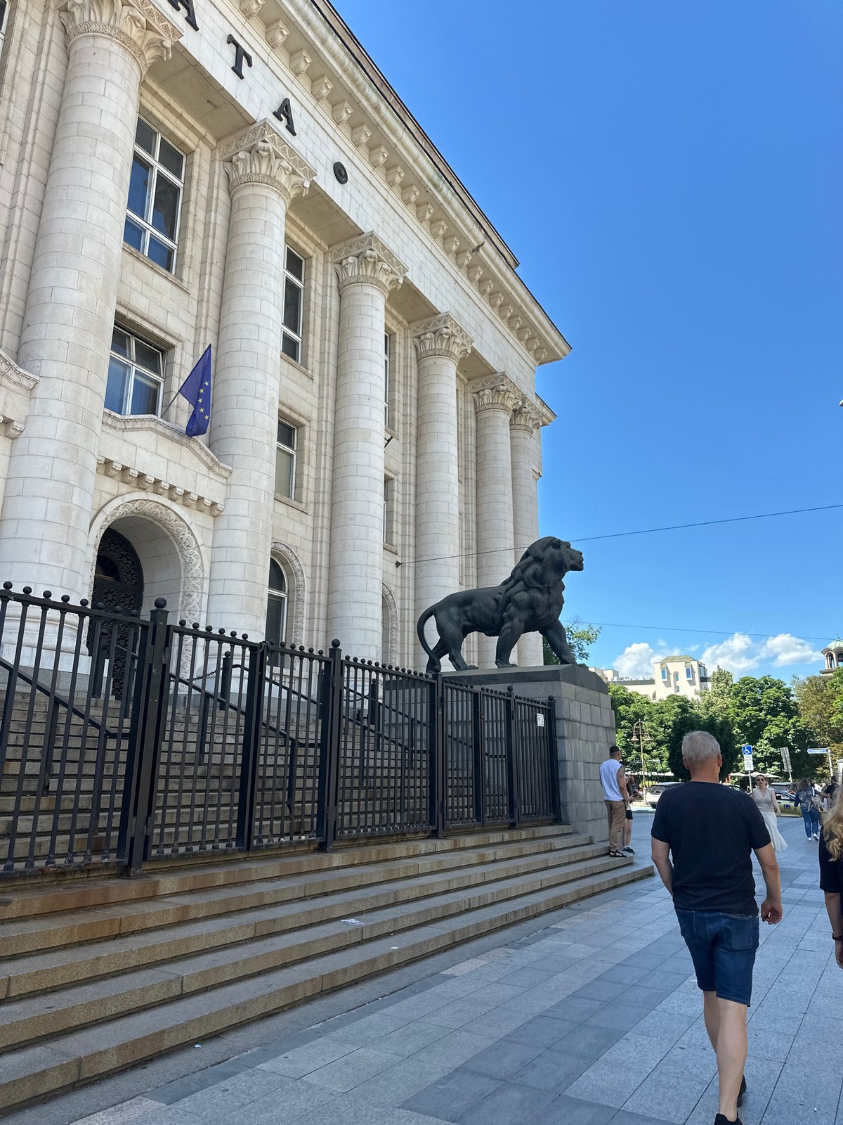 Walking tour through Sofia's historic center with trams and landmarks