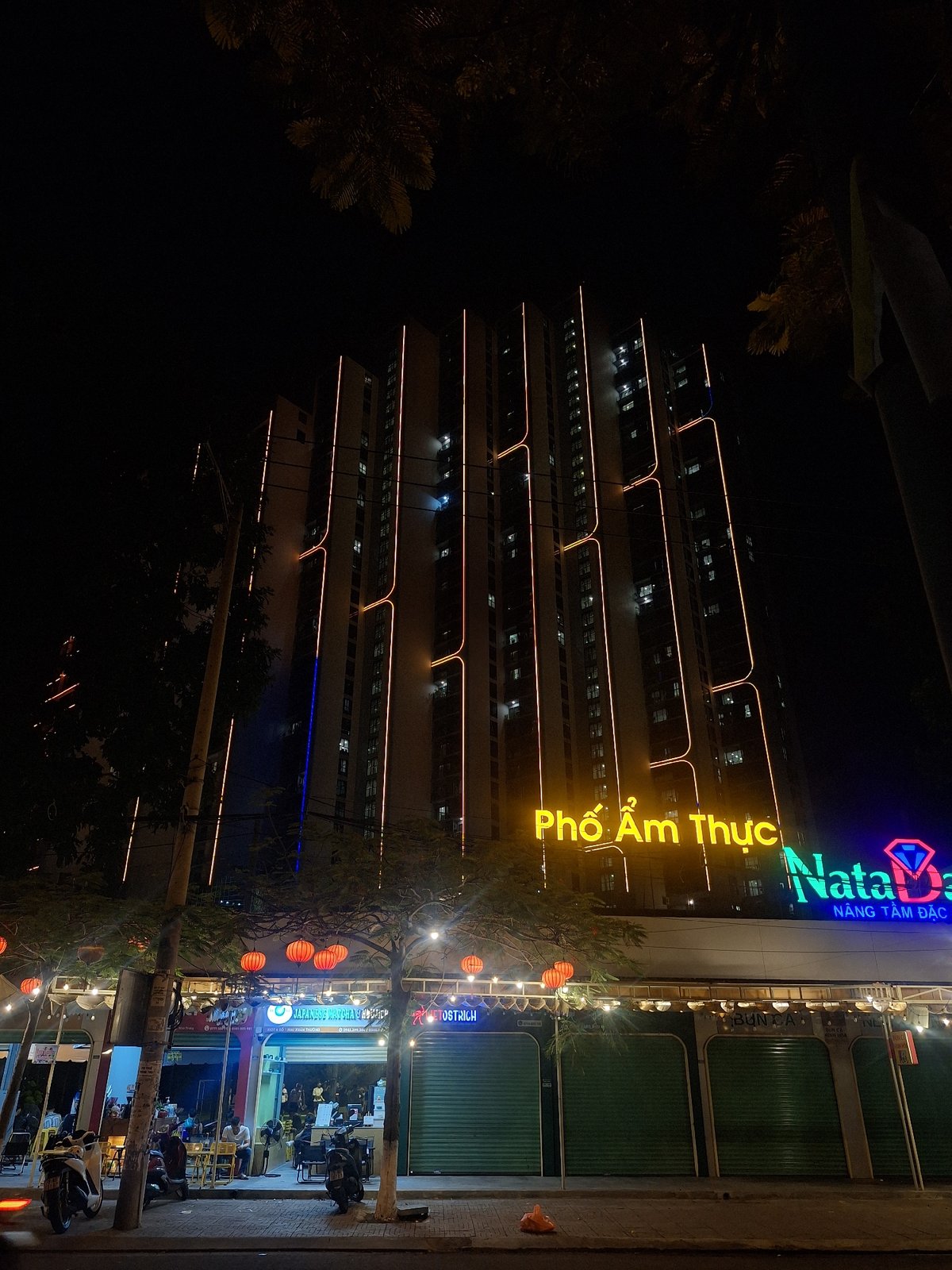 Nha Trang food street lit up at night