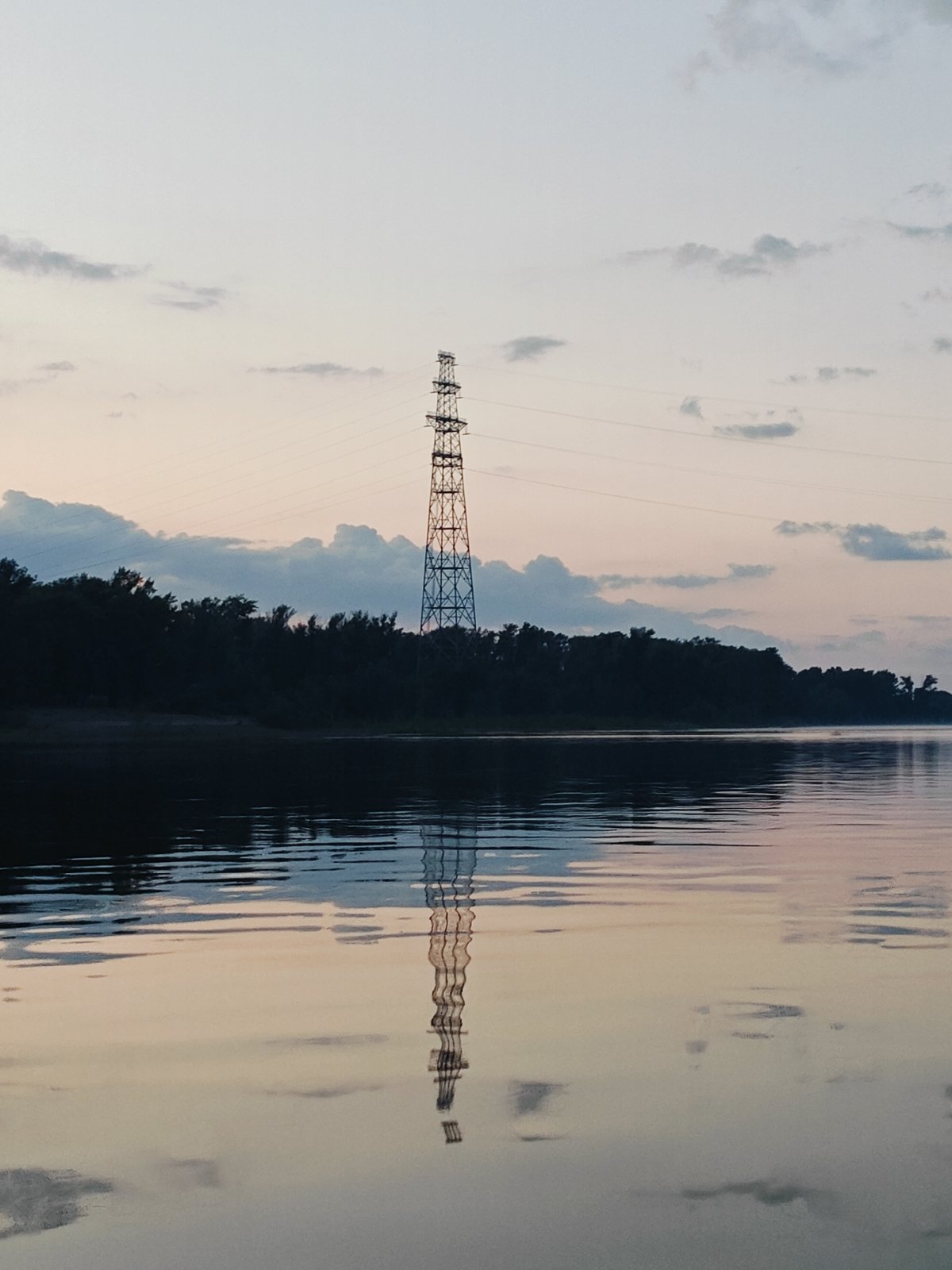Evening on the water near Ol'khovskoye, pylons and boats