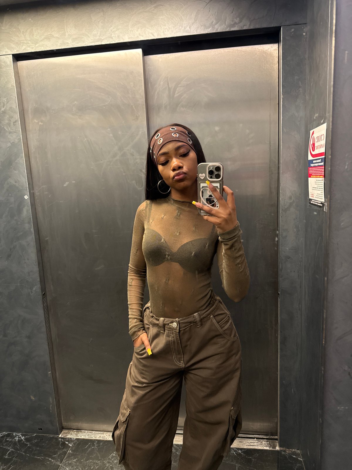 Woman Takes Selfie in Elevator in Bobrovo, Russia