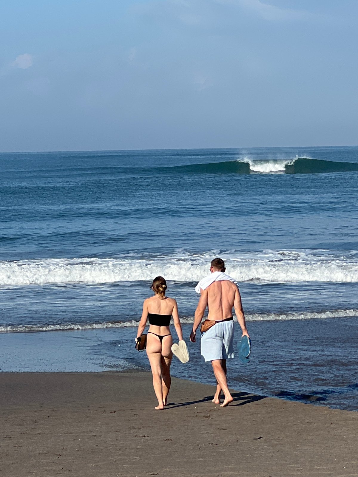 Mass crab gathering draws attention on North Kuta's dark sand beach