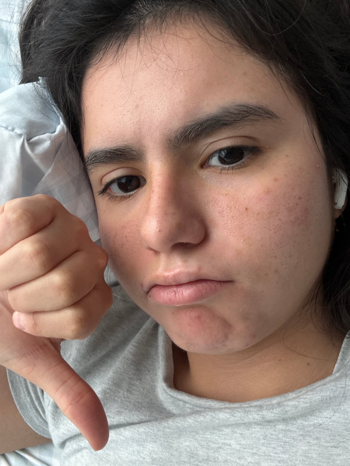 Austin resident documents personal portraits, medical dressing in bedroom