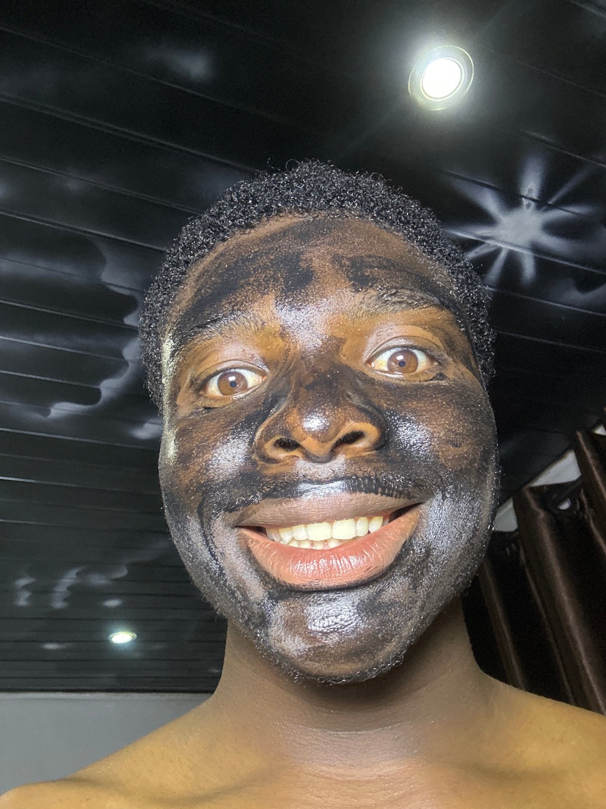 Person applies facial treatment in Bukuru, Nigeria