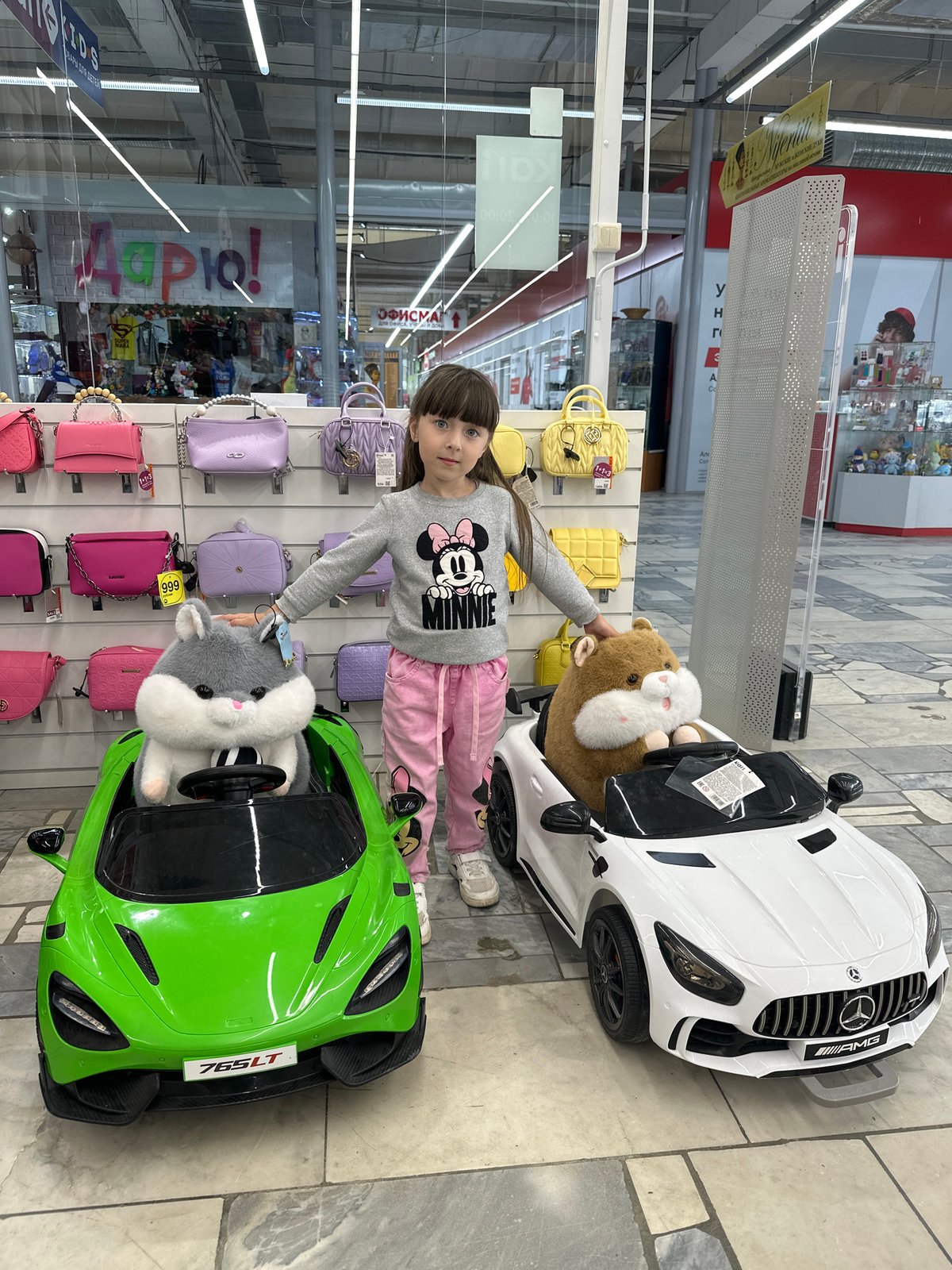 Afternoon at a Chaikovsky mall: playground, snacks, and stormy skies