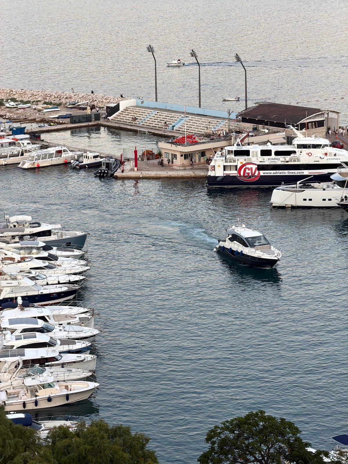 Budva's Old Town and marina at dusk, July 2026