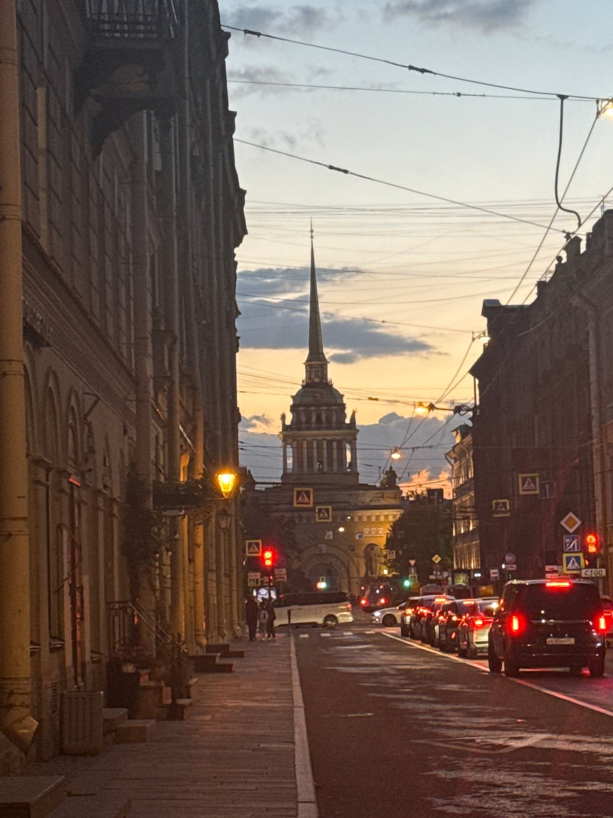 Tourist captures Saint Petersburg landmarks during evening hours