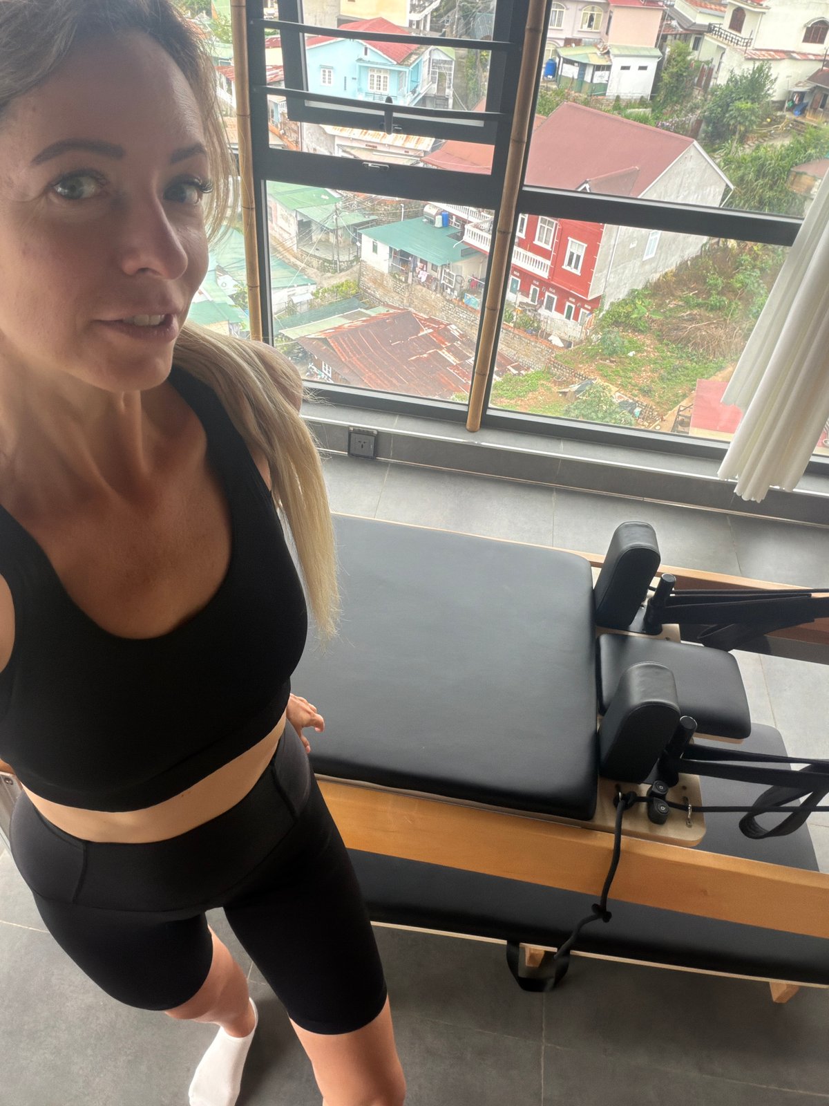 Pilates studio selfies and Da Lat street scenes, July 2026