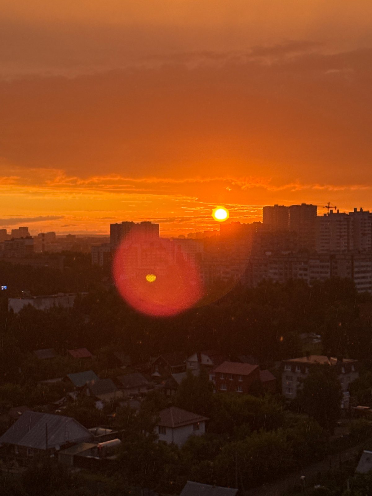 Golden hour sunset over Izhevsk, rainbow included