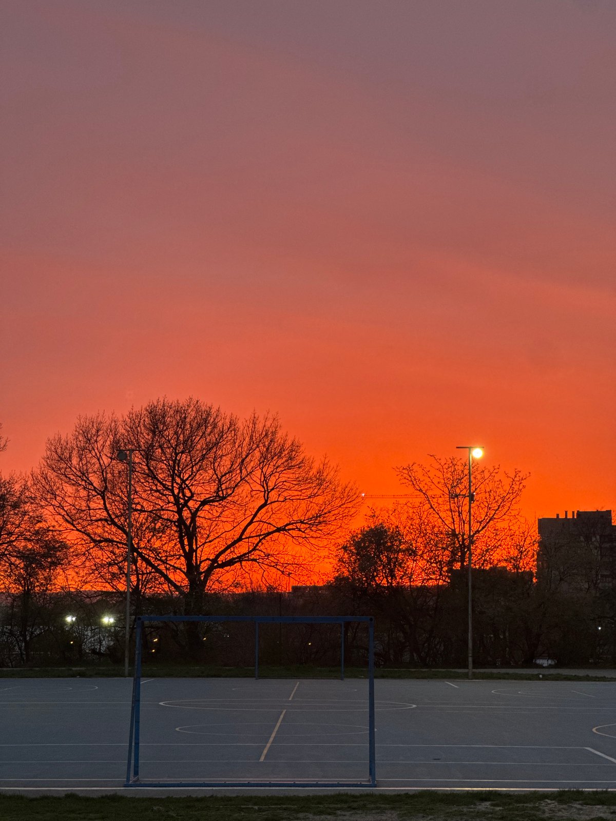 Dramatic sunset illuminates basketball court in Varna, Bulgaria