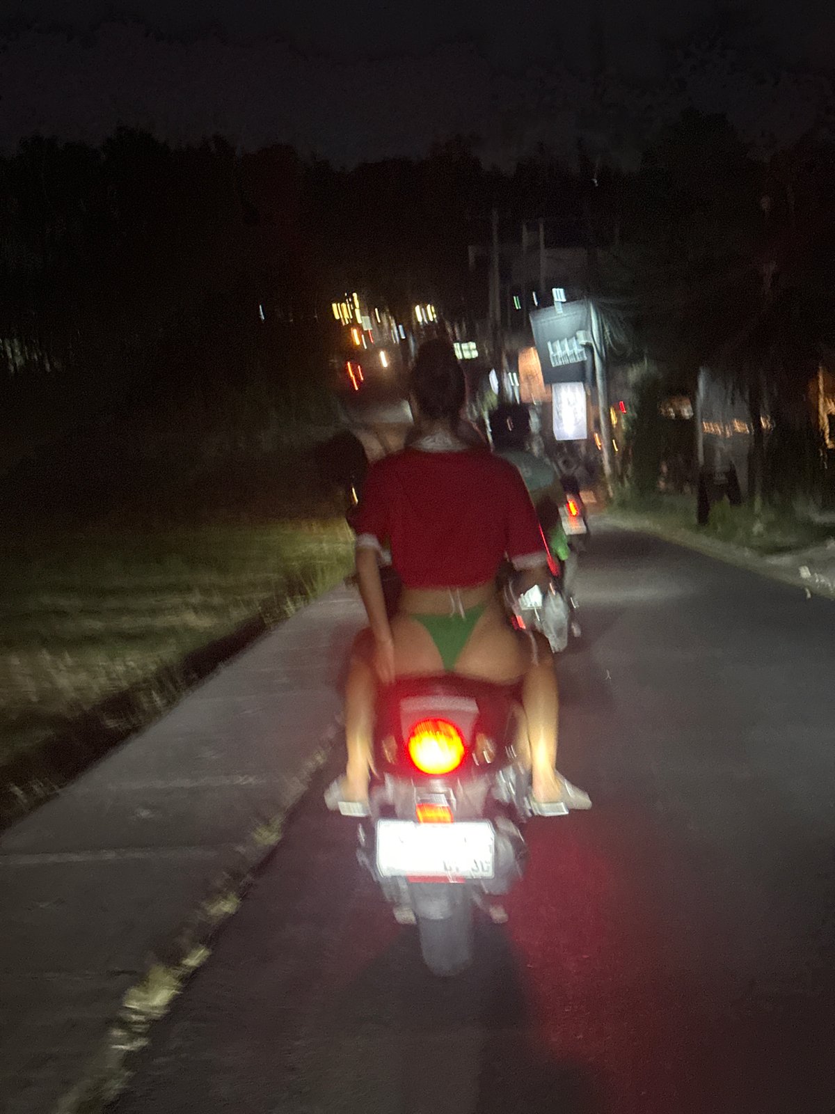 Rice paddies and street life mix across a North Kuta morning