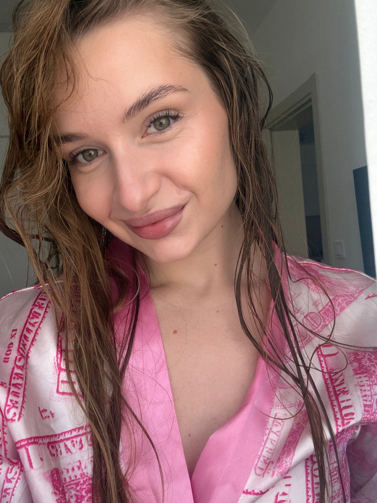 Woman in dollar-print robe photographed multiple times in Budva