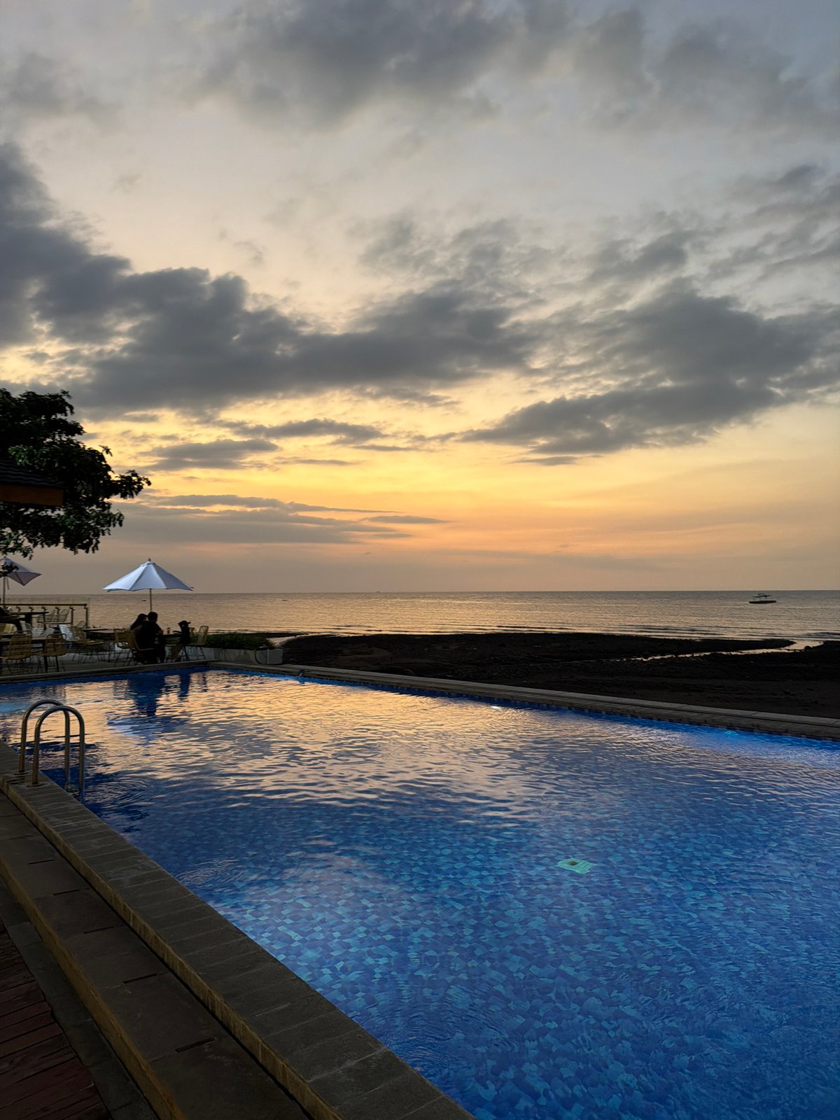 Dusk at a beachfront resort in Pasir Putih, Indonesia