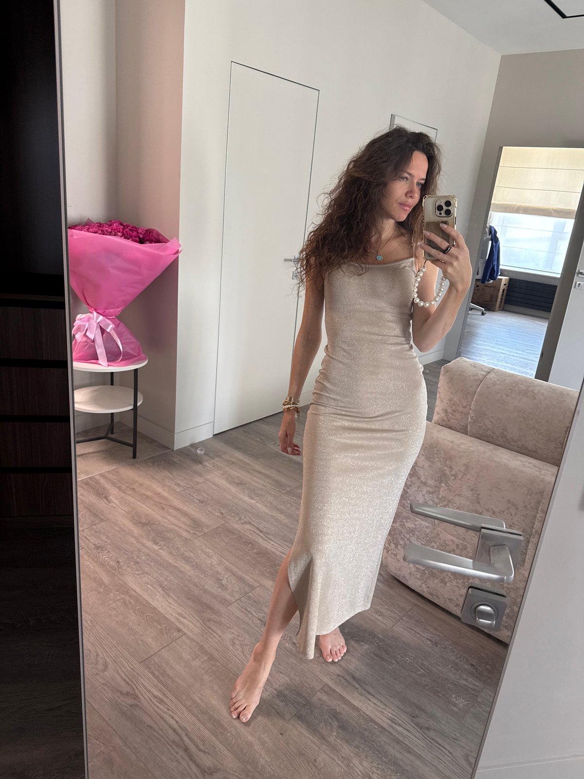 Mirror selfie series in a beige formal dress, getting ready