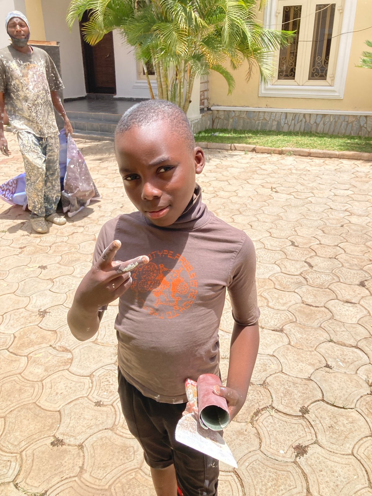 Building maintenance and painting activities documented in Jos, Nigeria