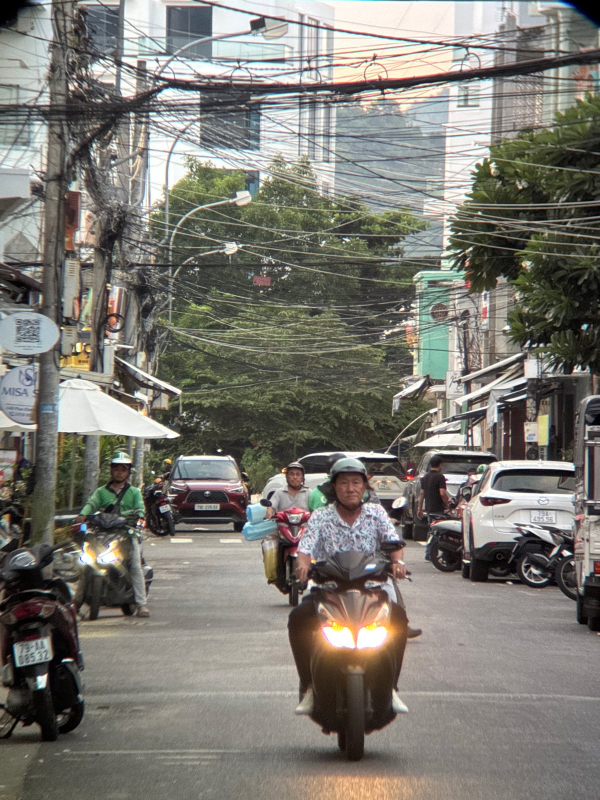 Street-level Nha Trang: traffic, sidewalks, and city details