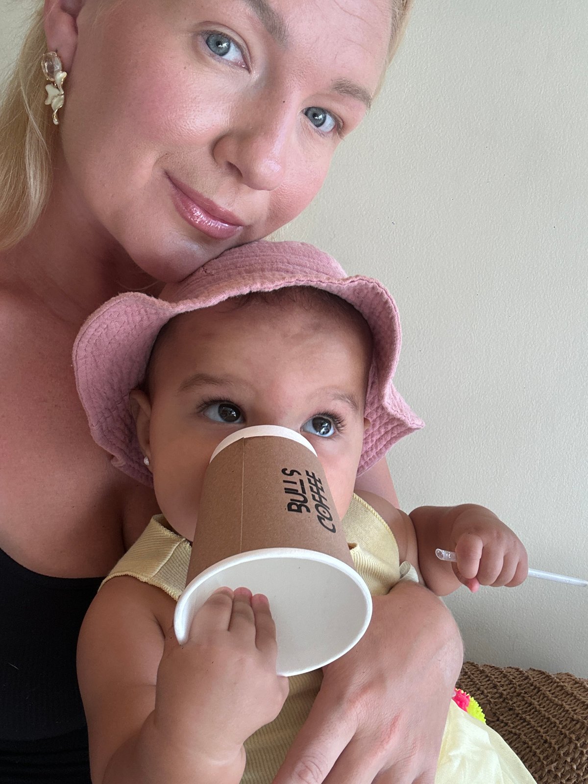 Mother and baby enjoy garden time in North Kuta