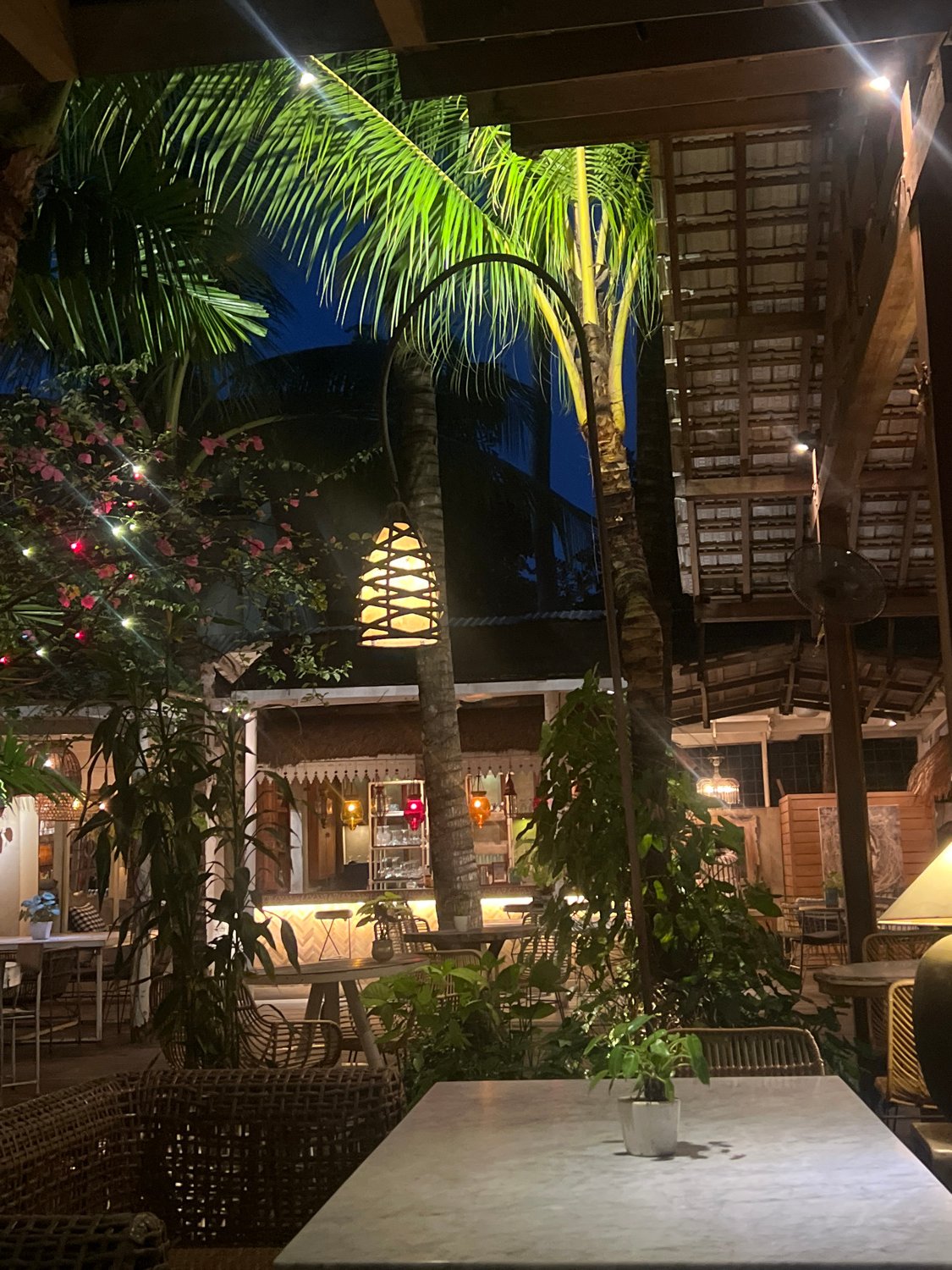 Evening diners captured at outdoor restaurant in North Kuta
