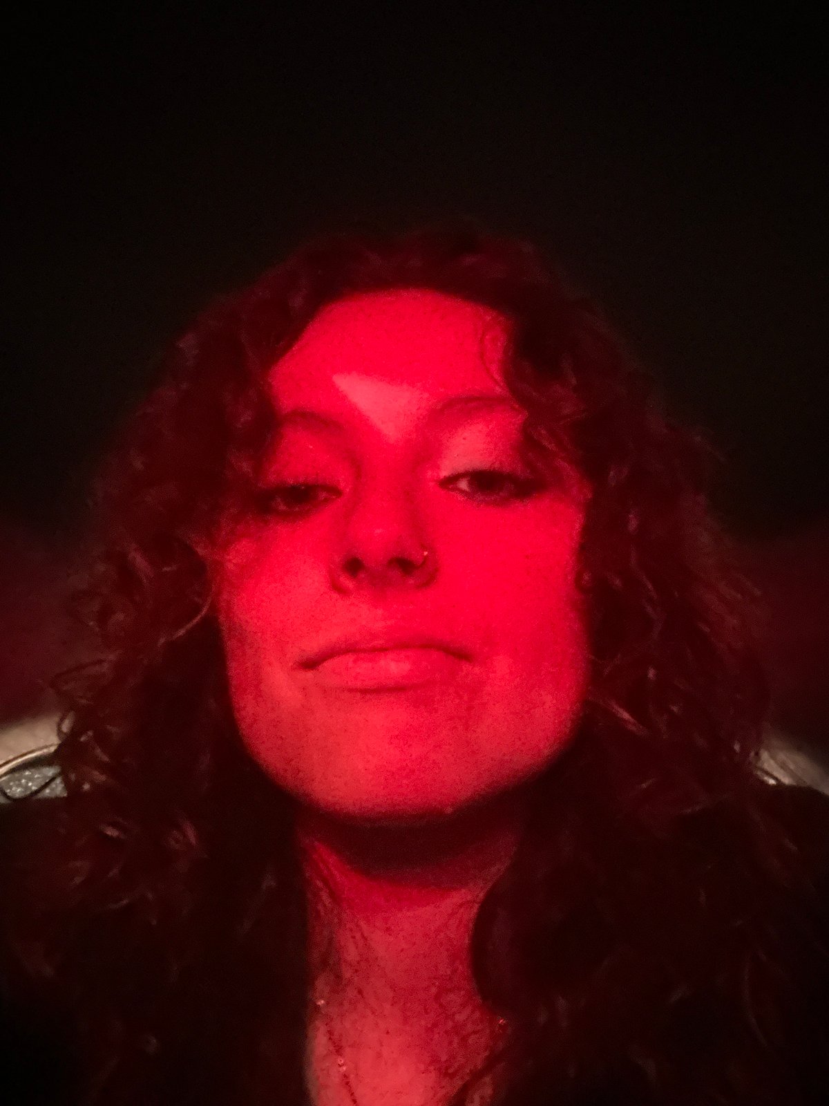 Red-lit portrait captured in Mexico City early morning