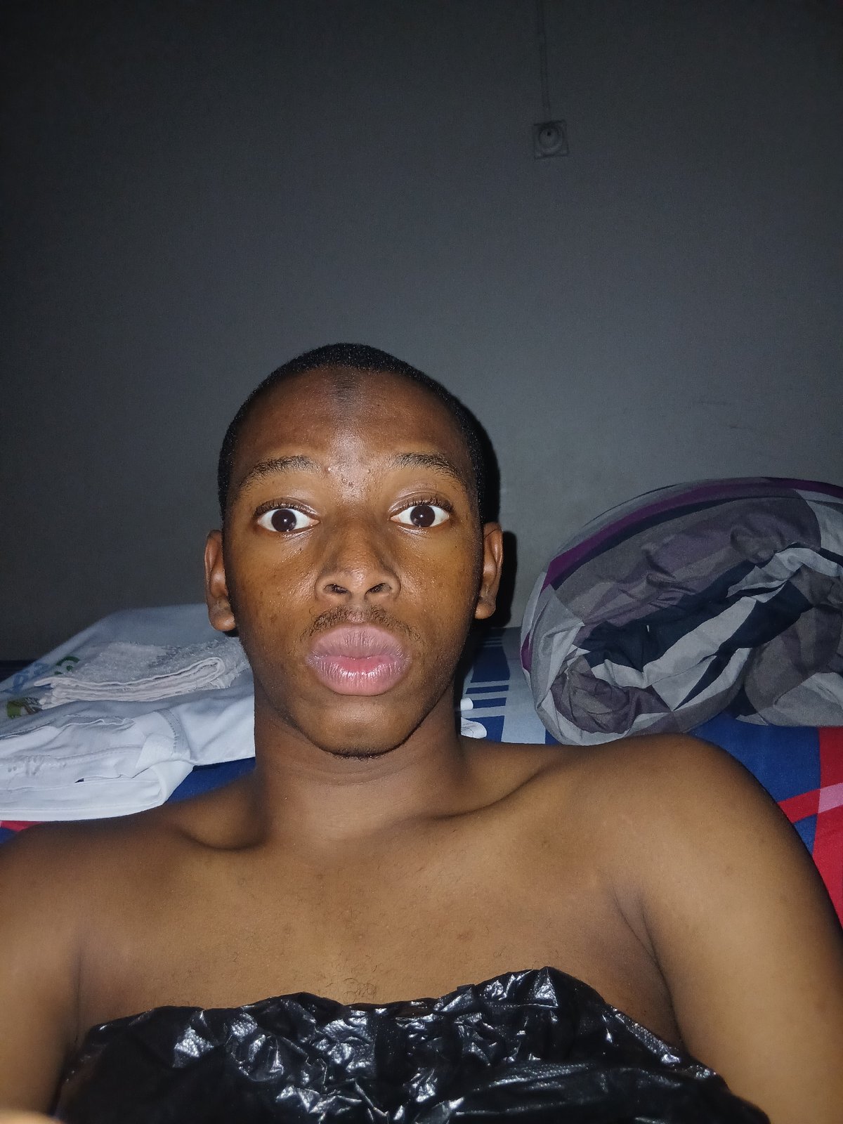 Casual bedroom selfie session in Lagos, Nigeria.