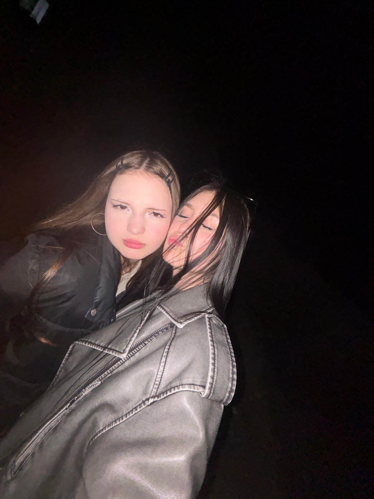 Two women photographed at night in Foki, Russia