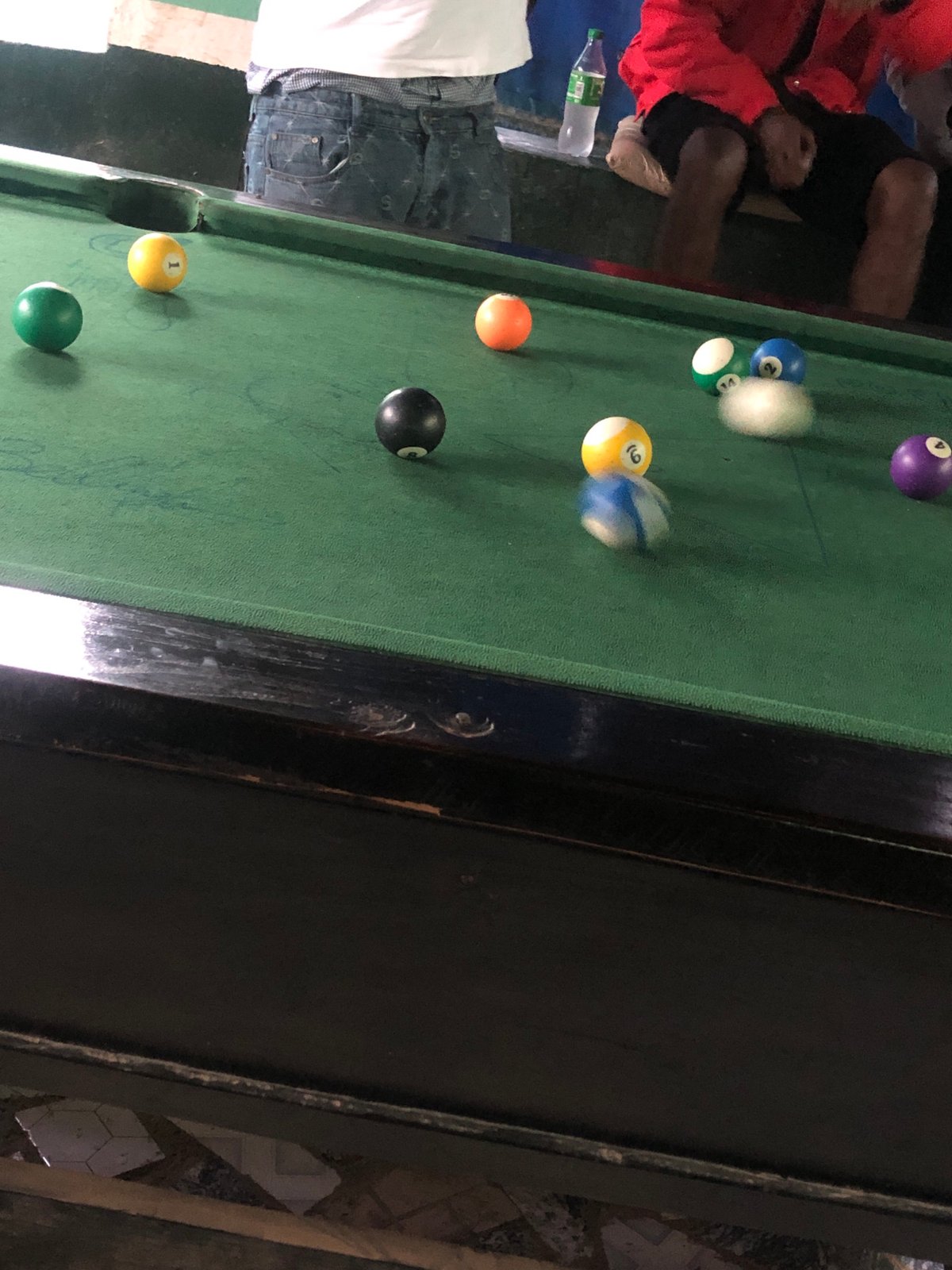 Pool game in full swing at a New Stadium, Nigeria bar